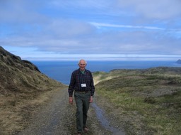 Tom on road above harbor img_2094