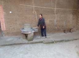 Woman with Grinder p1020330